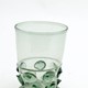Noppenbeker, glas na 1550 - voor 1625. Berkemeier glas of noppenbeker, met getande standring en doornnoppen. Het glas is ongeschonden en helder. © Slot Loevestein, publiek domein.