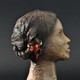 Replica hoofd Meta uit Meteren met bijzondere sieraden uit de IJzertijd © bron: uitgave gemeente Geldermalsen, foto Floris Reijnen